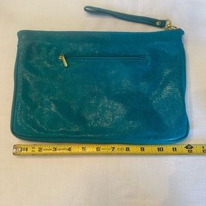 Genuine Italian leather clutch/ wristlet, pristine condition.